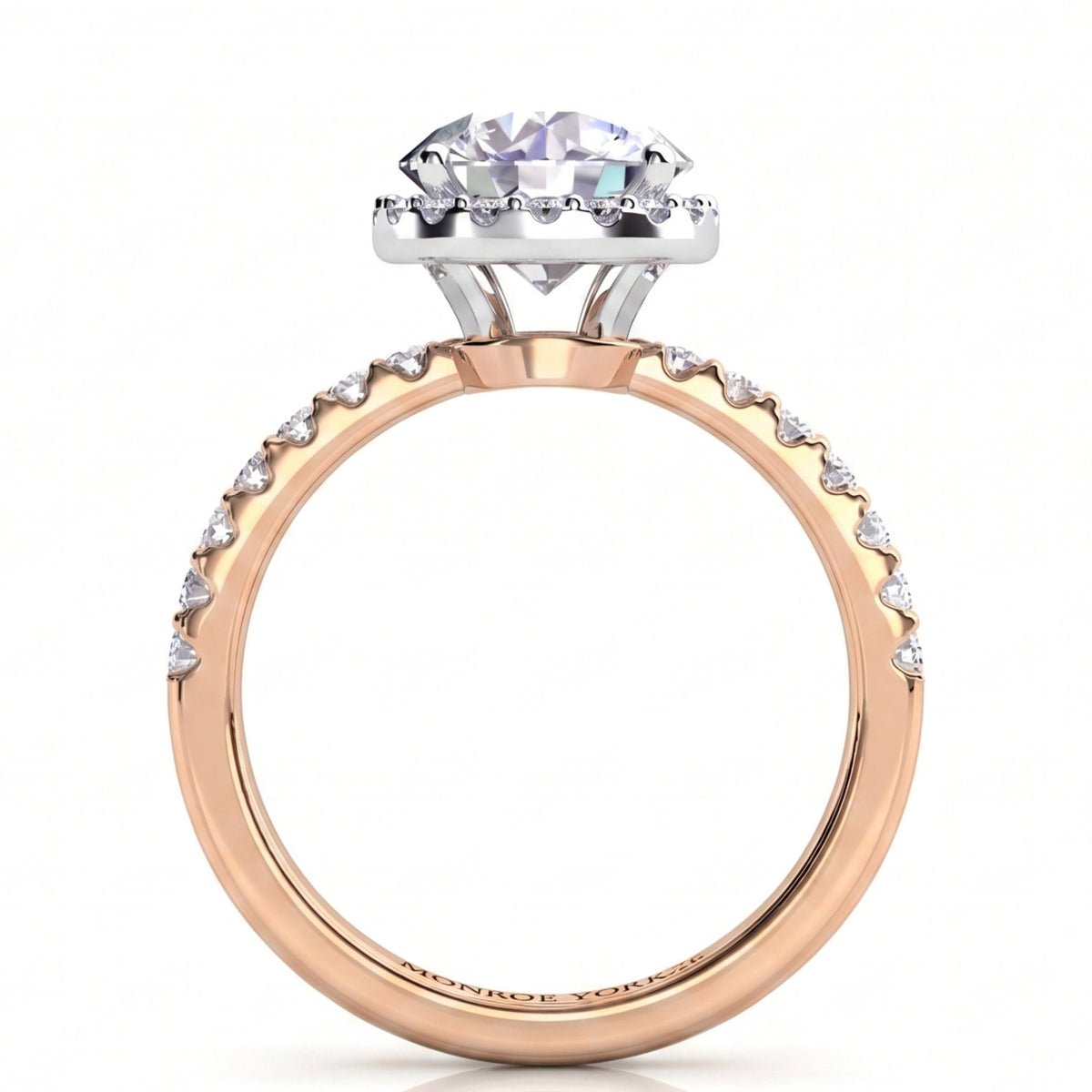 Orion rose gold engagement ring, round brilliant centre diamond with micro claw set accent diamonds along the shank.