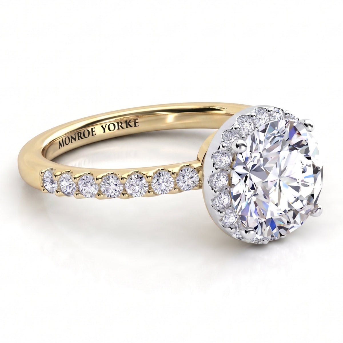 Orion yellow gold engagement ring, round brilliant centre diamond with a hidden halo and a diamond set band.