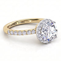 Orion yellow gold engagement ring, round brilliant centre diamond with a hidden halo and a diamond set band.