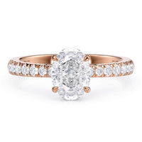 Paige hidden halo engagement ring in rose gold, side view showing the halo beneath the centre stone