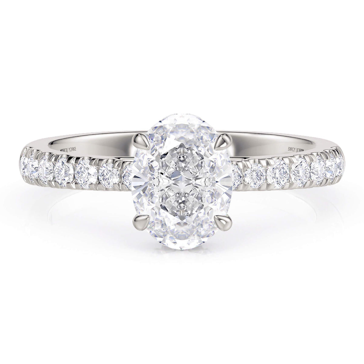 Paige hidden halo engagement ring in white gold, side view showing the halo beneath the centre stone