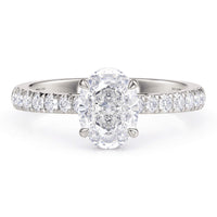 Paige hidden halo engagement ring in white gold, side view showing the halo beneath the centre stone