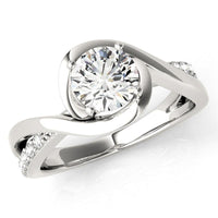 Piper wrap engagement ring in white gold, front view showing the band crossing over itself around the centre diamond. White gold or platinum