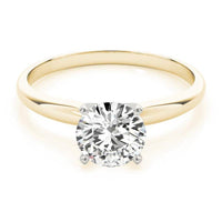 Promise yellow gold solitaire ring, angled view showing the highly polished plain band