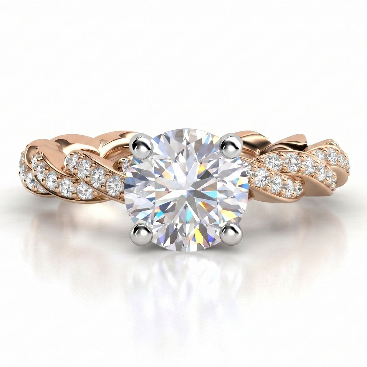 Quinn engagement ring in rose gold. Round brilliant centre diamond above a braided pave-set band.