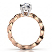 Quinn engagement ring in rose gold, second side view of the centre setting.