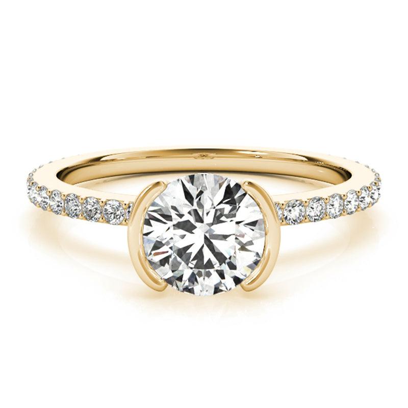 Riley yellow gold half rub-over ring, top view showing the open sides of the setting