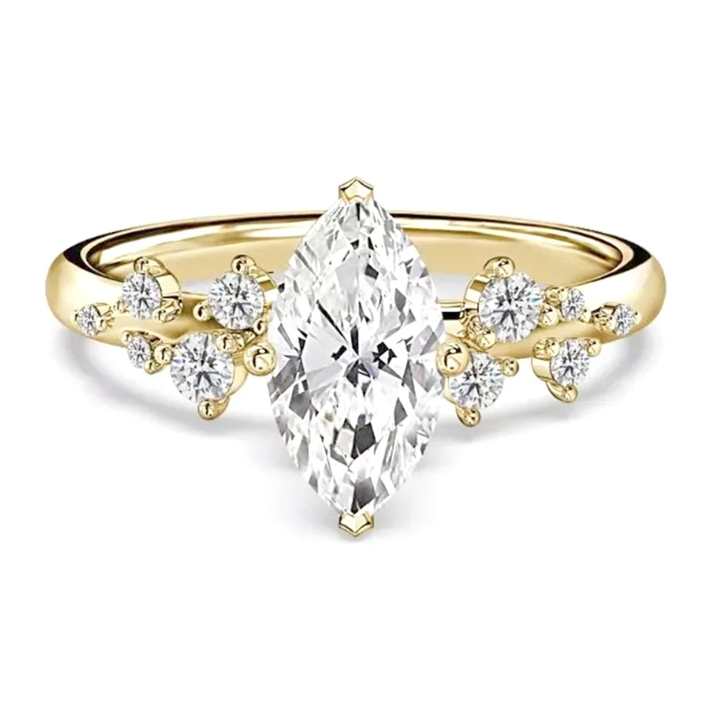 Rosalie Marquise Cut Diamond Ring. 10 smaller sparkling diamonds scattered gracefully along the band. Centre diamonds available between 1.00 and 8.00 carats. 