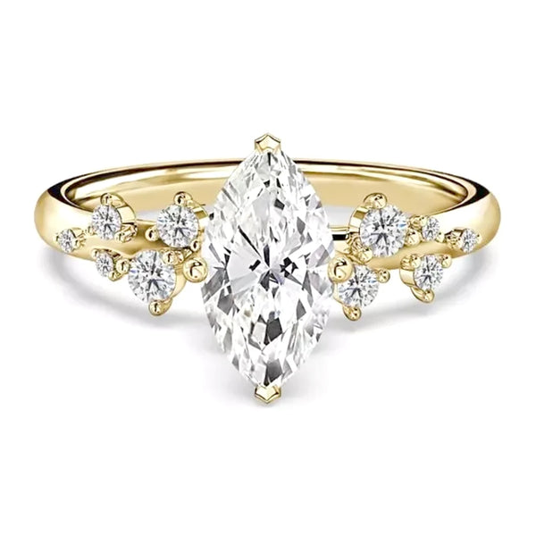Rosalie Marquise Cut Lab Grown Diamond Ring. 10 smaller sparkling diamonds scattered gracefully along the band. Centre diamonds available between 1.00 and 8.00 carats. 