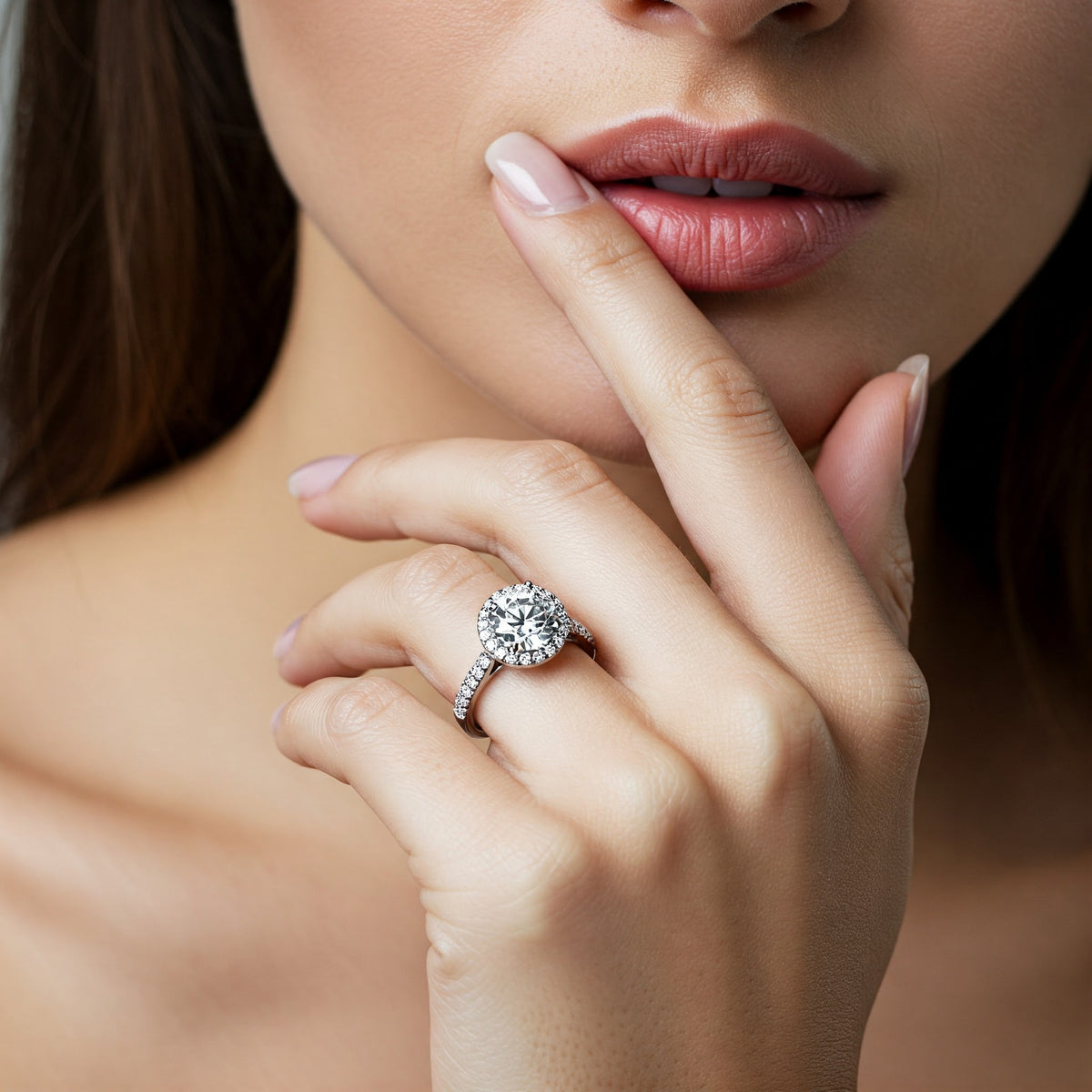 Ariana - diamond halo engagement ring on a hand — view 7