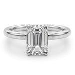 Skye front view - Emerald Cut Diamond solitaire ring with round claws. On a white gold or platinum band. 