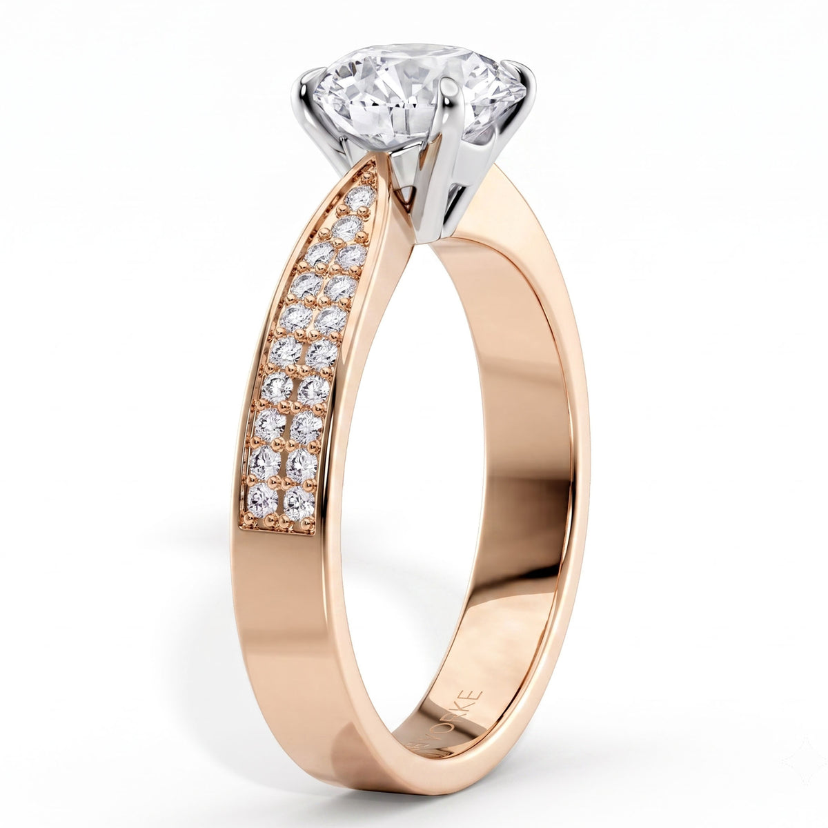 Sophia - Rose gold engagement ring, side view showing the four claw centre setting.