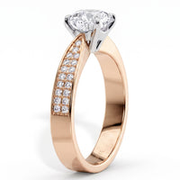 Sophia - Rose gold engagement ring, side view showing the four claw centre setting.
