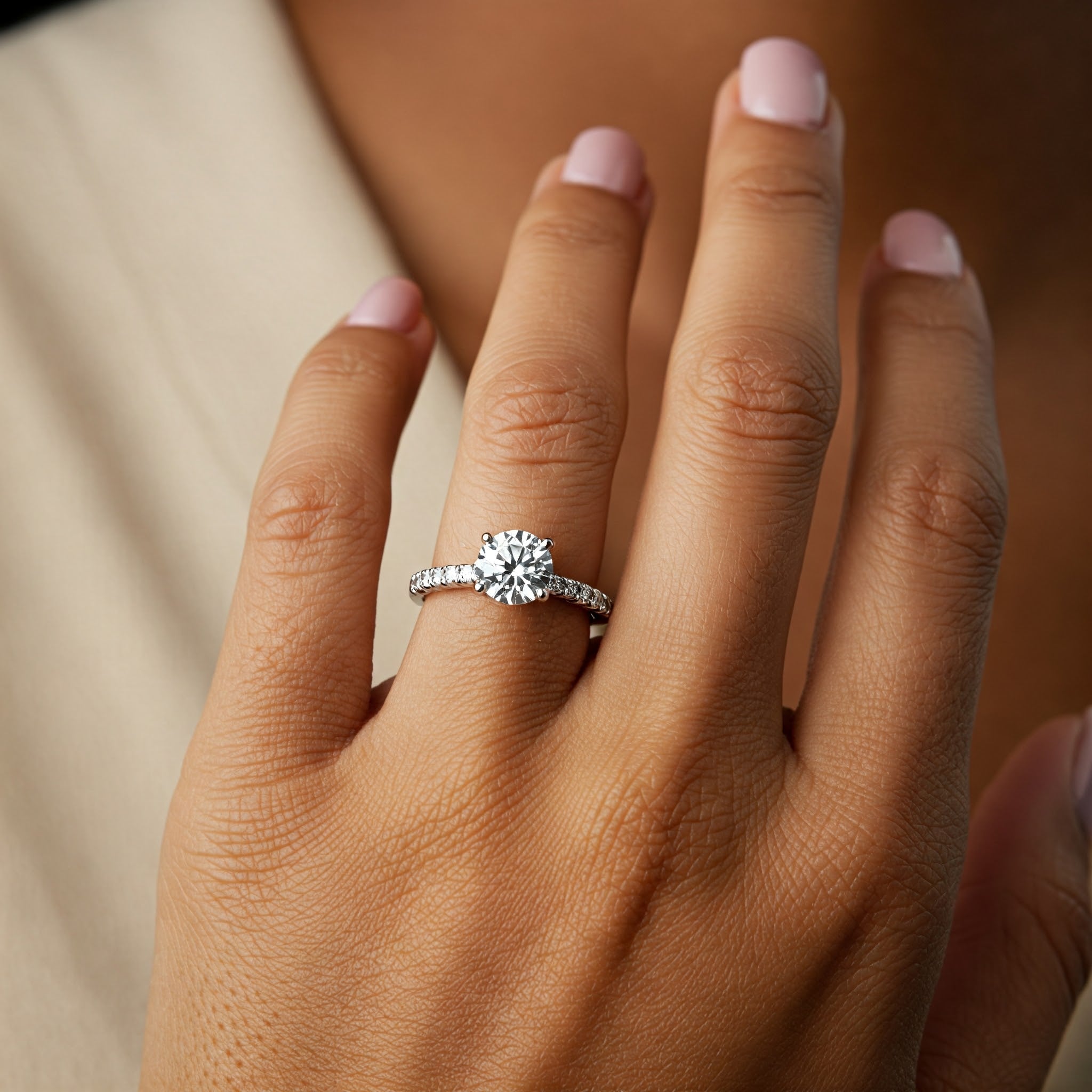Spring diamond engagement ring in platinum with diamonds on the band. 