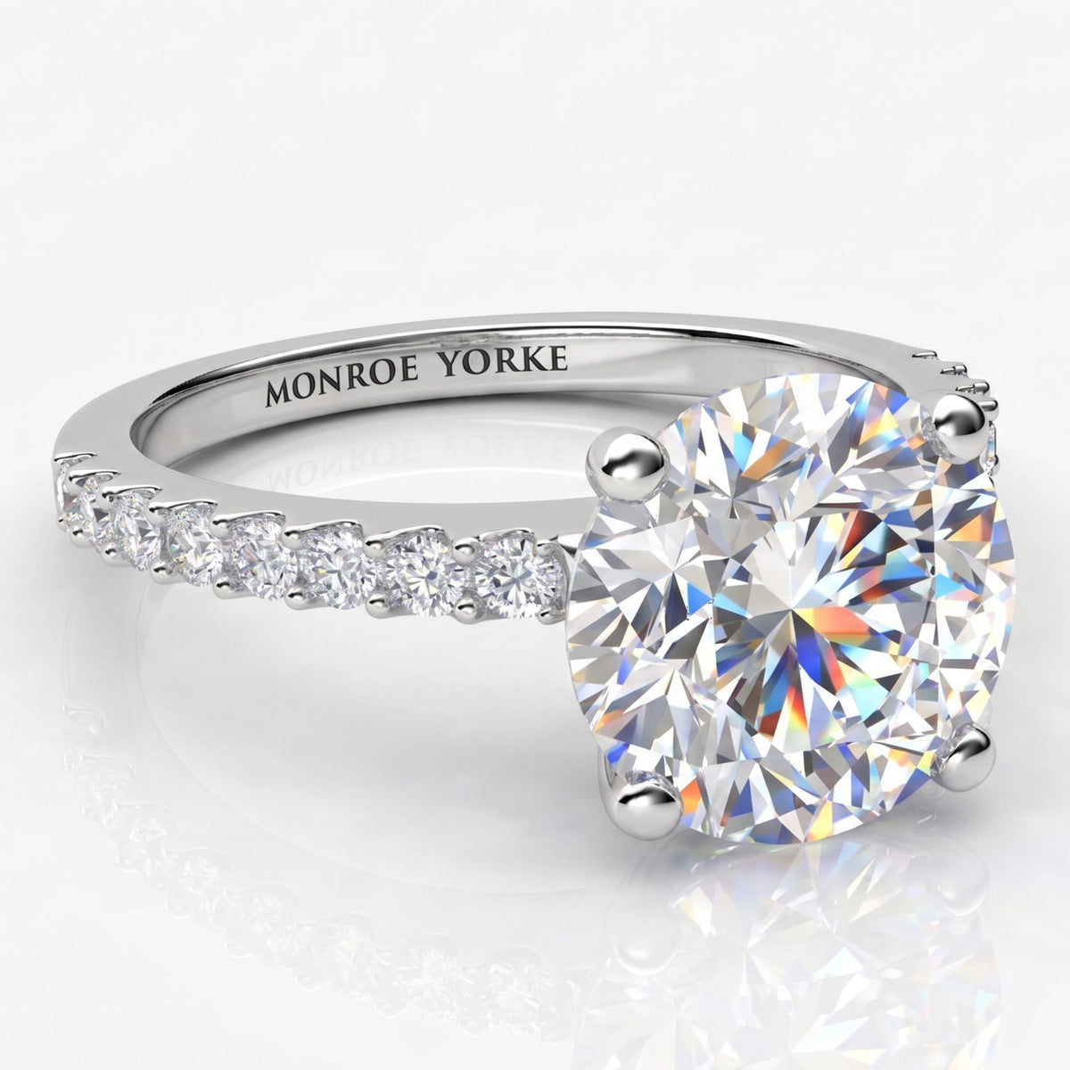 Round Diamond Ring, diamonds on the band in white gold or platinum