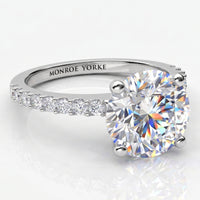Round Diamond Ring, diamonds on the band in white gold or platinum