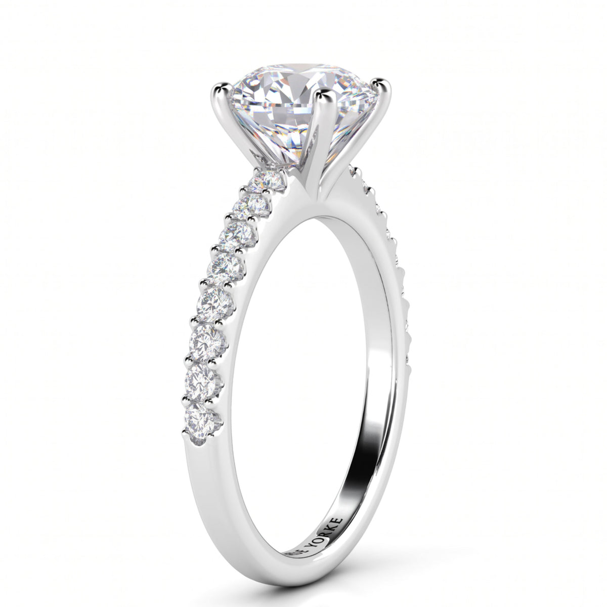 Spring Diamond Ring side view showing the beautiful centre setting. White gold or platinum
