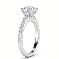 Spring Diamond Ring side view showing the beautiful centre setting. White gold or platinum