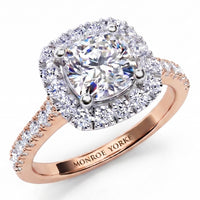 Summer - diamond engagement ring with a cushion cut diamond surround by a halo of diamonds.  Plus diamonds on the band. Rose Gold 
