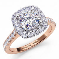 Summer - diamond engagement ring with a cushion cut diamond surrounded by a halo of diamonds. Plus diamonds on the band. Rose Gold