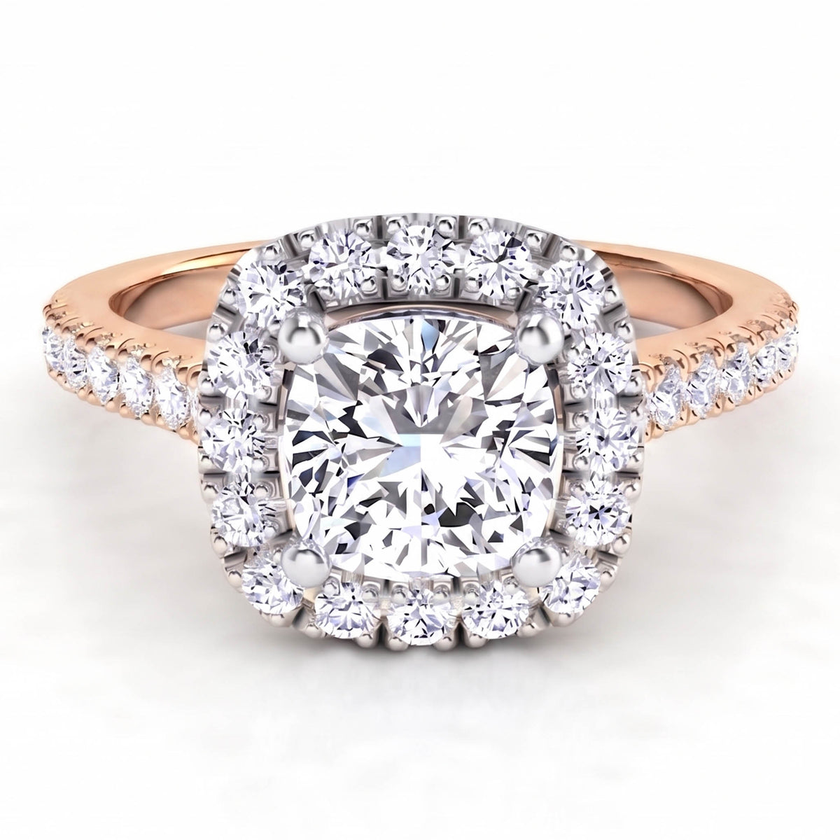 Summer Rose Gold - diamond engagement ring with a cushion cut diamond surround by a halo of diamonds.  Plus diamonds on the band.