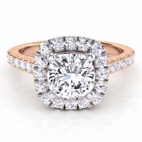 Summer Rose Gold - diamond engagement ring with a cushion cut diamond surround by a halo of diamonds.  Plus diamonds on the band.