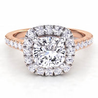 Summer Rose Gold - diamond engagement ring with a cushion cut diamond surrounded by a halo of diamonds. Plus diamonds on the band.