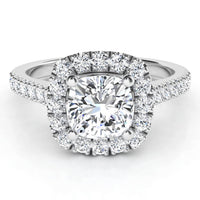 Summer - top view. Cushion cut diamond halo engagement ring with diamonds down the band.  White Gold or platinum