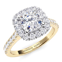 Summer - engagement ring with a centre cushion cut diamond and a diamond halo, with diamonds on the band. yellow gold