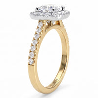 Side view of Summer halo diamond ring with a centre cushion cut diamond. Yellow gold band