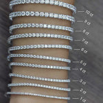 6 carat lab grown diamond tennis bracelet shown on a hand compared to other sizes