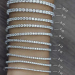 7 carat  diamond tennis bracelet shown on a hand compared to other sizes