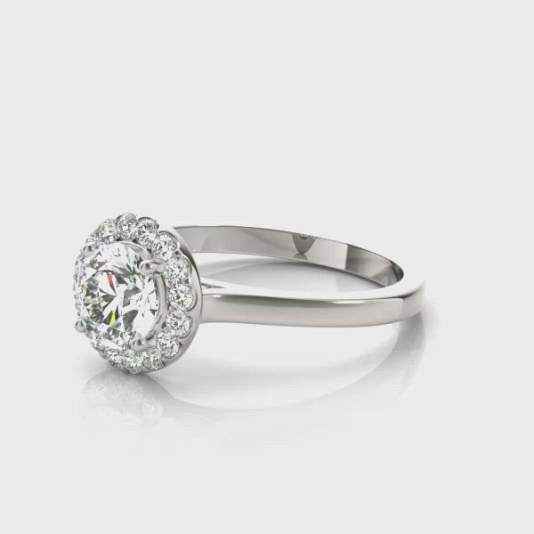Halo diamond ring available in white gold or platinum.  Also available in yellow gold or rose gold.