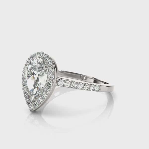 Maisie - Fit for a Queen. Centre 2.0 Carat Pear Cut Lab Grown Diamond Halo Ring