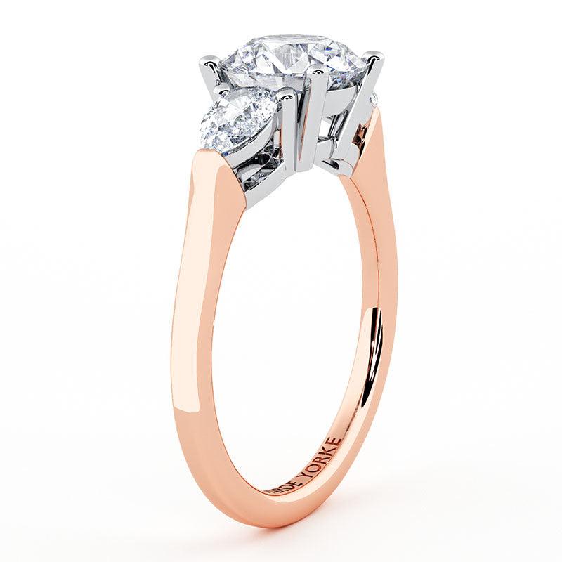 Adele - rose gold diamond trilogy ring. Side view showing the beautiful centre setting. 