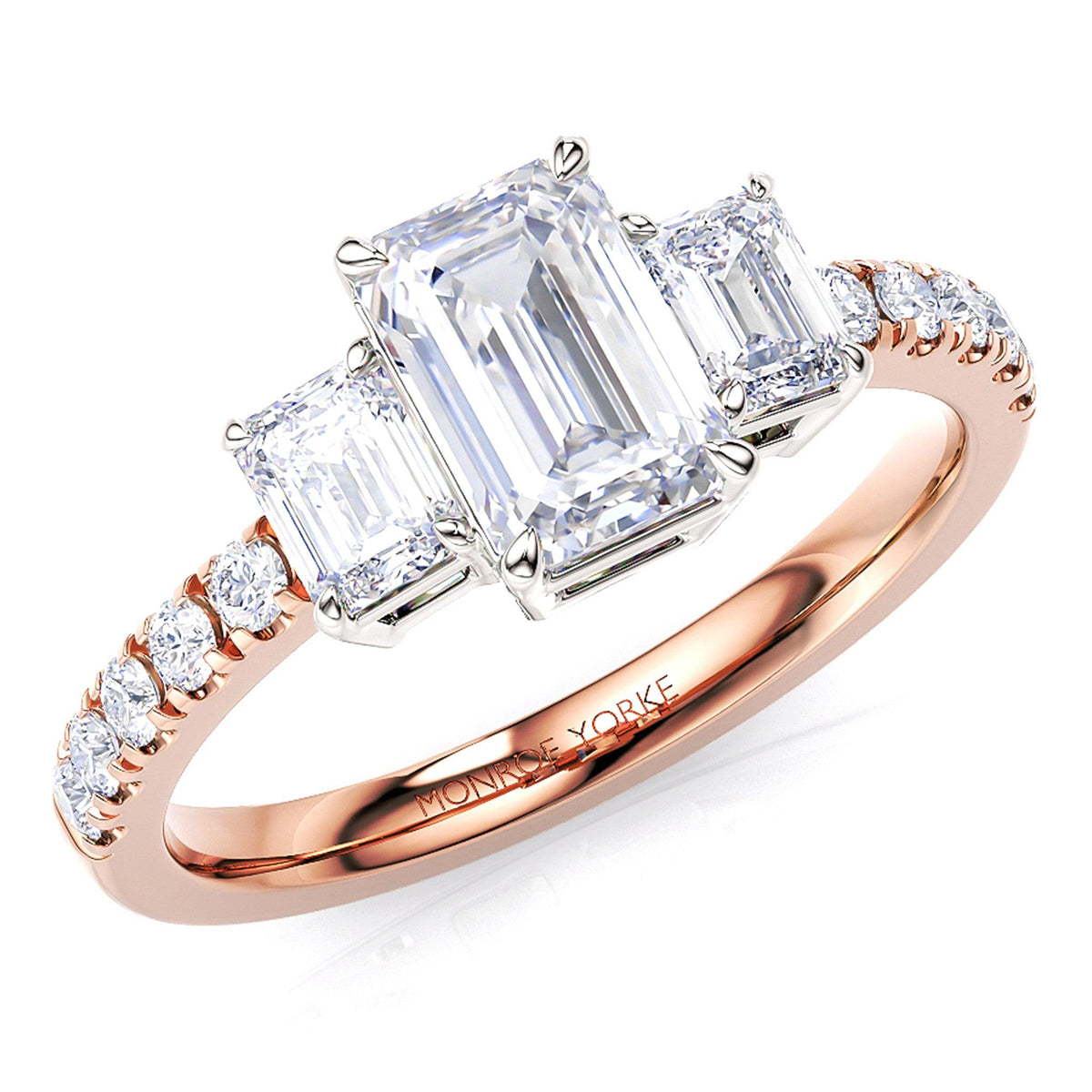Aspen - Emerald cut three diamond engagement ring. Diamond set band in rose gold.  — view 3