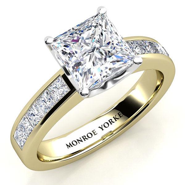 Albany gold princess cut diamond engagement ring. Gold band with channel set princess cut diamonds. Centre GIA certified princess cut diamond 