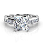 Albany White Gold.  Front view. princess cut diamond centre with channel set princess cut diamonds on the band. 