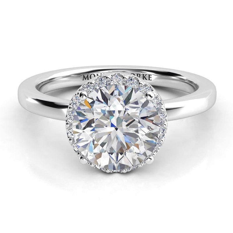 Diamond halo engagement Ring in platinum. Alexa in platinum