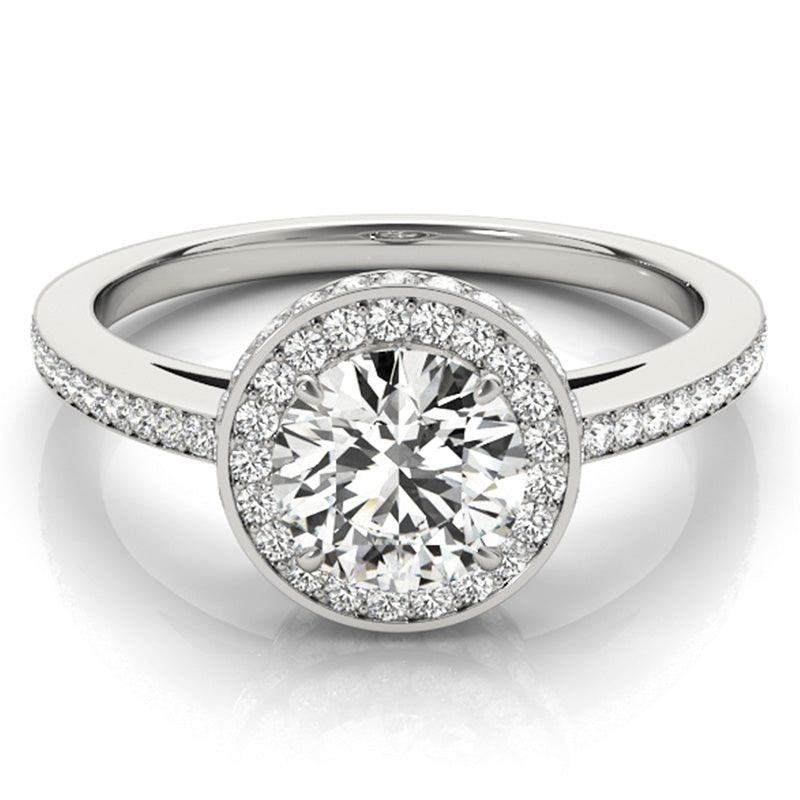 Unique diamond halo engagement ring in platinum