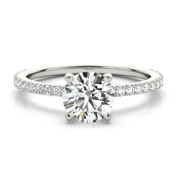 April - Round diamond ring with diamonds down the band. White gold or platinum. 