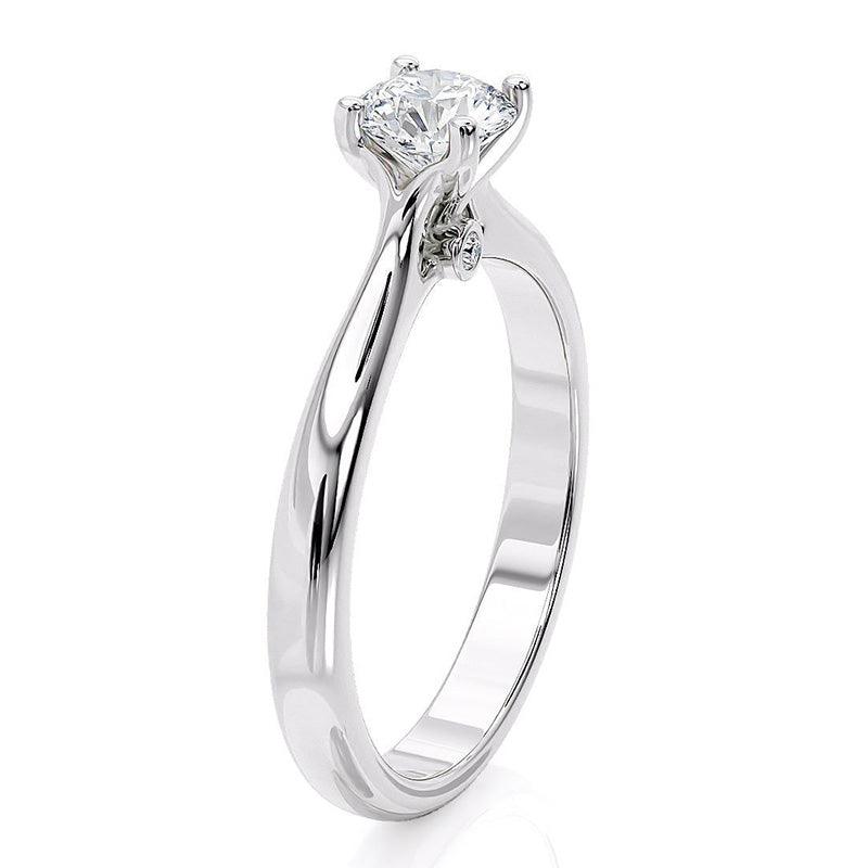 Asti - White gold diamond solitaire ring. 4 claw setting. Side view. 