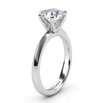Calais in Platinum.  Six claw solitaire diamond engagement ring.  Knife edge band. Side view showing knife edge band.