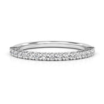 Callisto - Claw set diamond wedding ring.  0.35 carats of diamonds. White gold or platinum 