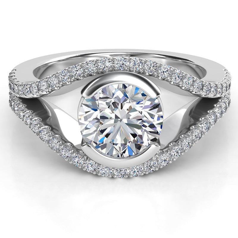 Unique diamond engagement ring with centre round diamond. Created in platinum. 