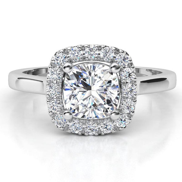 Carina - GIA certified cushion cut halo diamond engagement ring in platinum.  Halo of round diamonds set around the main cushion cut diamond.