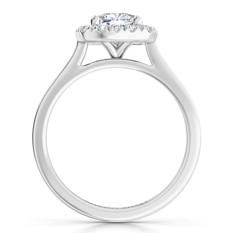 Carina - GIA certified cushion cut halo diamond engagement ring in platinum.  Side view