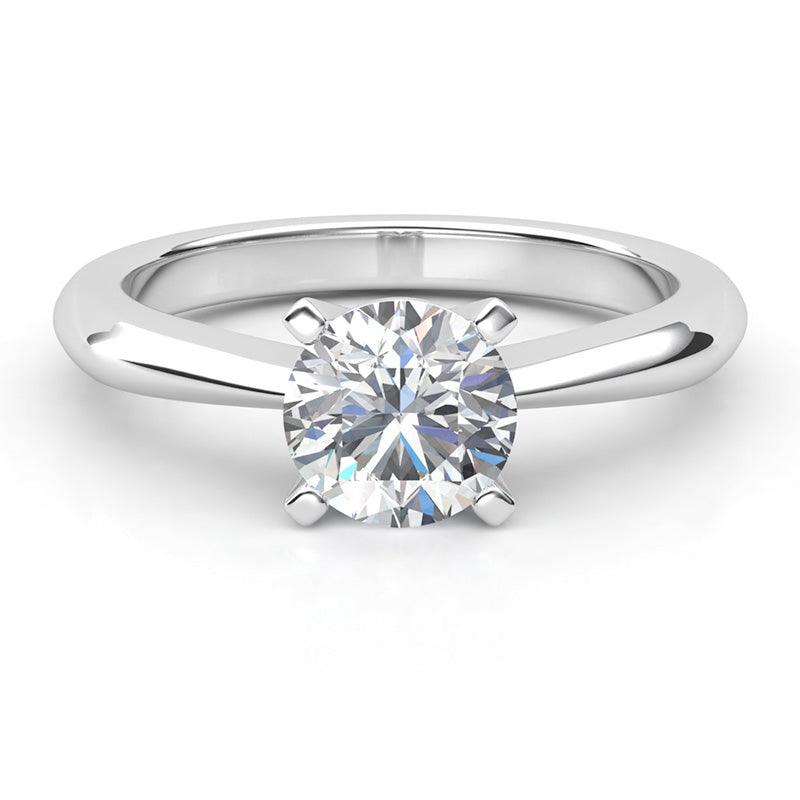 Cece - Four Claw Round Solitaire Diamond Ring. White Gold. Band tapers into the centre setting 