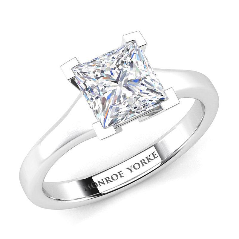 Princess cut solitaire diamond engagement ring.  Centre GIA certified princess cut diamond in a V claw setting. 18ct white gold