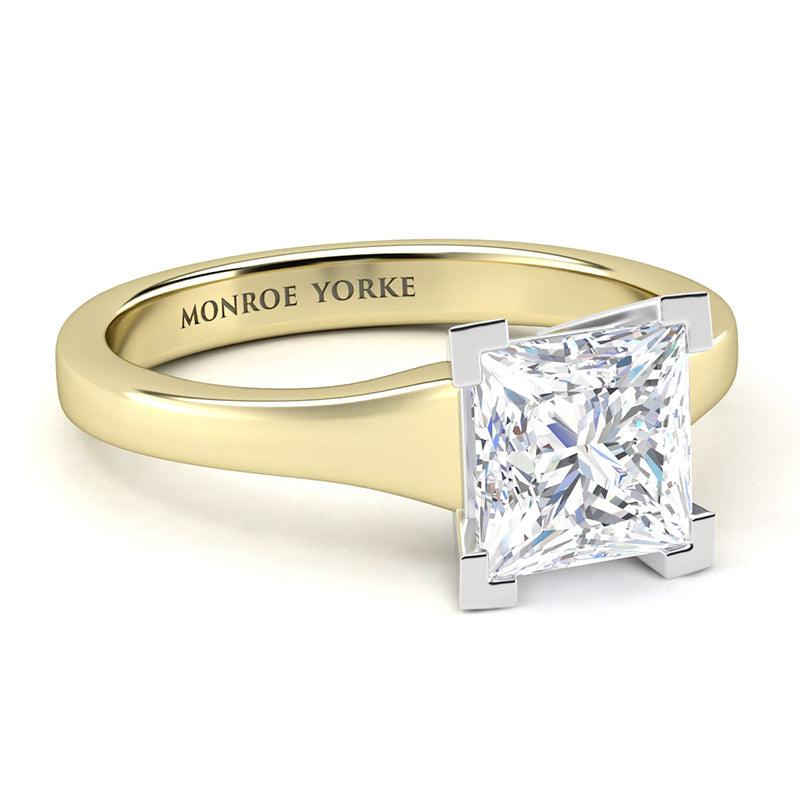 Side view - Princess cut diamond solitaire ring.  Yellow gold band and white gold centre setting.  Chester